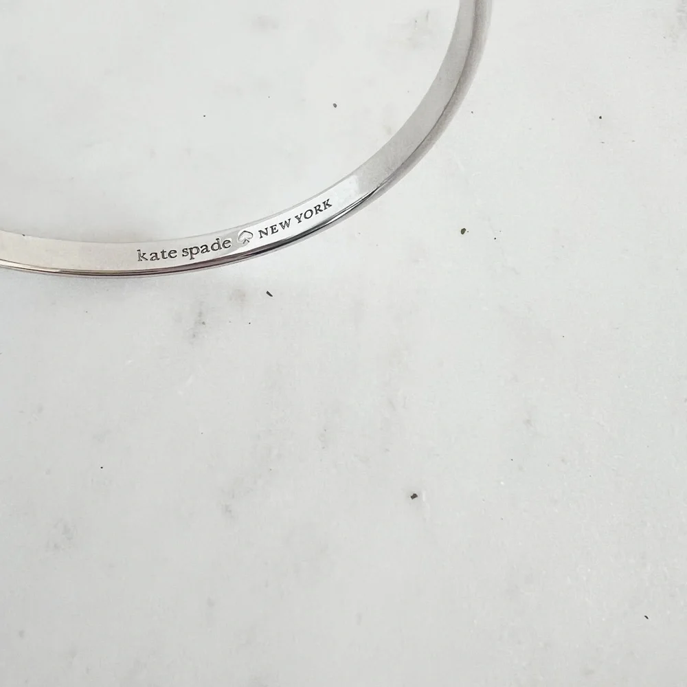 Kate Spade:New York Elegant and simple Silver Bangle engraved Bracelet - Picture 2 of 3